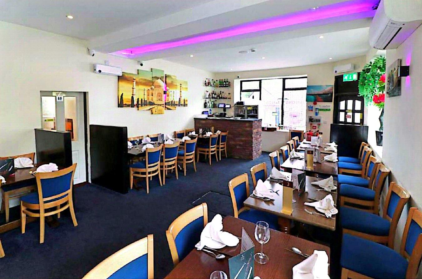 Jaflong dining room with purple ambient lighting